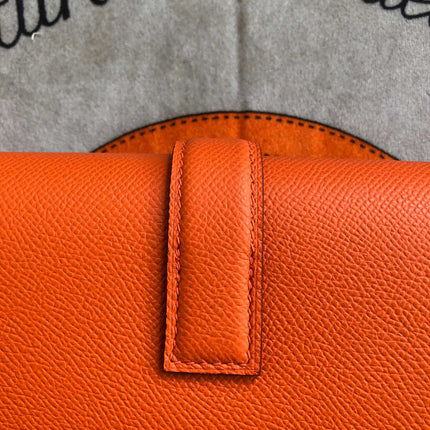 JIGE ELAN 29 CLUTCH IN SALAMANDER ORANGE CALFSKIN