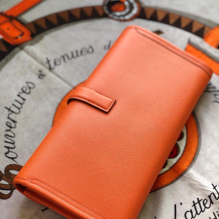 JIGE ELAN 29 CLUTCH IN SALAMANDER ORANGE CALFSKIN
