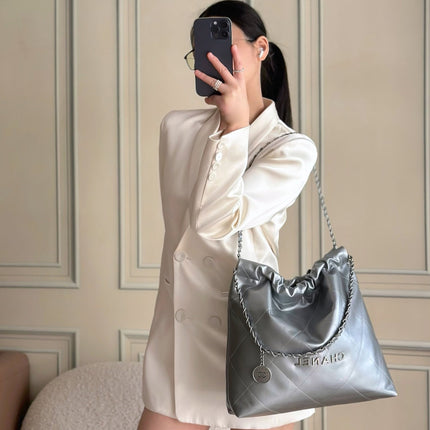 CHANEL 26S 22 BAG 42 IN METALLIC SILVER QUILTED SHINY CALFSKIN