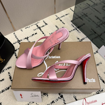 CHRISTIAN LOUBOUTIN 26S CROSS-STRAP HIGH HEEL SANDALS 105 MM IN LIGHT PINK SATIN