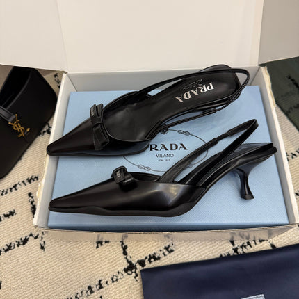 PRADA 26S BUCKLE STRAP SLINGBACK PUMPS IN BLACK CALFSKIN WITH BOW
