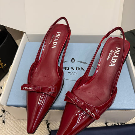 PRADA 26S BUCKLE STRAP SLINGBACK PUMPS IN DARK RED PATENT CALFSKIN WITH BOW