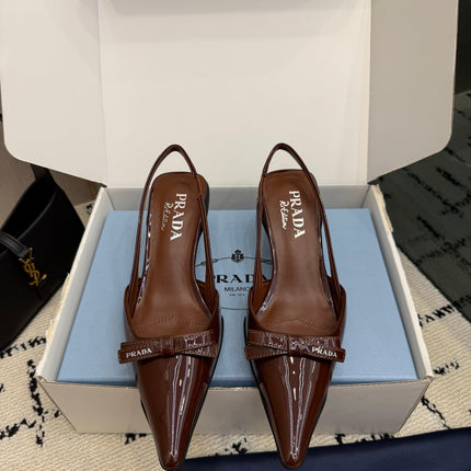 PRADA 26S BUCKLE STRAP SLINGBACK PUMPS IN BROWN PATENT CALFSKIN WITH BOW