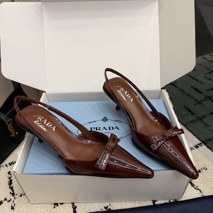 PRADA 26S BUCKLE STRAP SLINGBACK PUMPS IN BROWN PATENT CALFSKIN WITH BOW