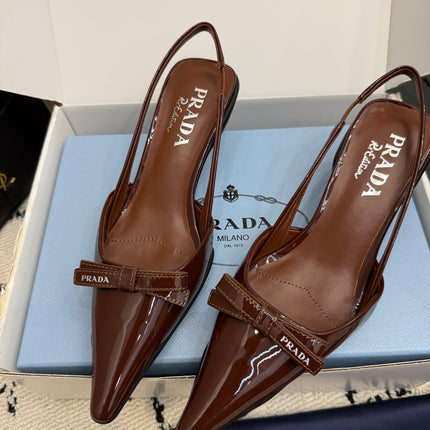 PRADA 26S BUCKLE STRAP SLINGBACK PUMPS IN BROWN PATENT CALFSKIN WITH BOW