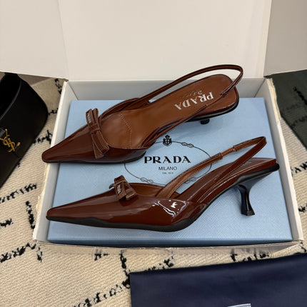 PRADA 26S BUCKLE STRAP SLINGBACK PUMPS IN BROWN PATENT CALFSKIN WITH BOW