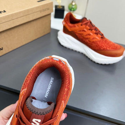 ALO 25S SALOMON ODYSSEY ELMT SNEAKER 45 MM IN DARK ORANGE FABRIC