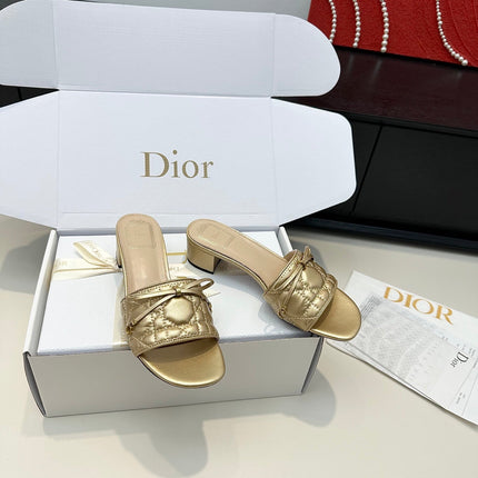 DIOR 26S BLOCK HEEL SLIDE SANDALS IN GOLD QUILTED CALFSKIN WITH BOW