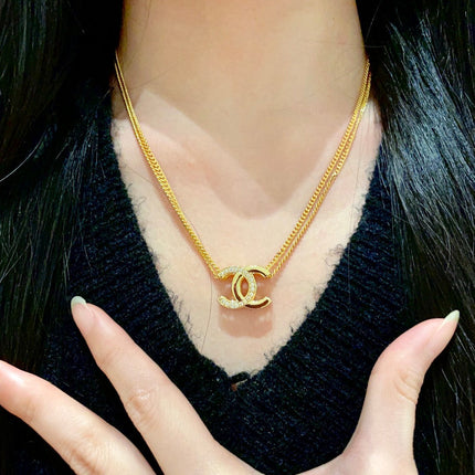 DOUBLE C HEART NECKLACE IN GOLD METAL