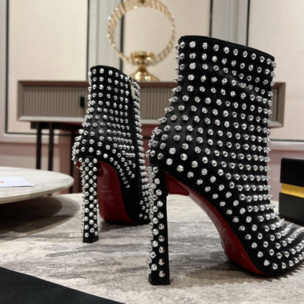 CHRISTIAN LOUBOUTIN 26S STUDDED ANKLE BOOTS 100 MM IN BLACK CALFSKIN