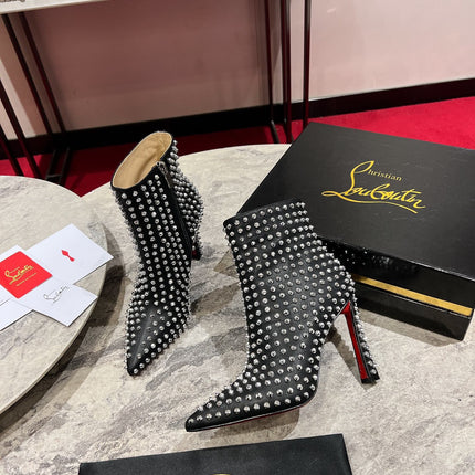 CHRISTIAN LOUBOUTIN 26S STUDDED ANKLE BOOTS 100 MM IN BLACK CALFSKIN