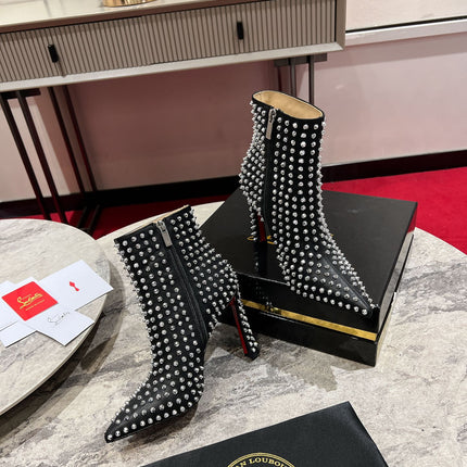 CHRISTIAN LOUBOUTIN 26S STUDDED ANKLE BOOTS 100 MM IN BLACK CALFSKIN