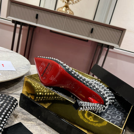 CHRISTIAN LOUBOUTIN 26S STUDDED ANKLE BOOTS 100 MM IN BLACK CALFSKIN