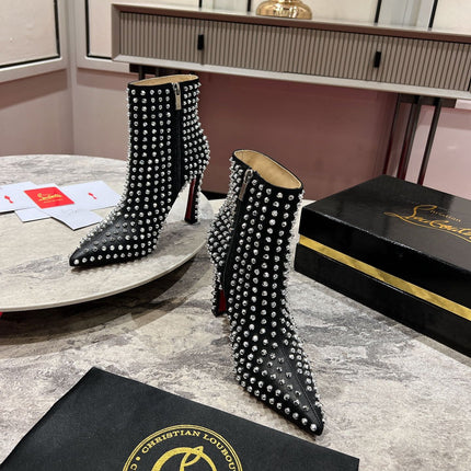 CHRISTIAN LOUBOUTIN 26S STUDDED ANKLE BOOTS 100 MM IN BLACK CALFSKIN
