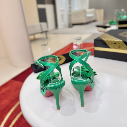 CHRISTIAN LOUBOUTIN 26S FLOWER-EMBELLISHED SANDALS 100 MM IN GREEN SATIN