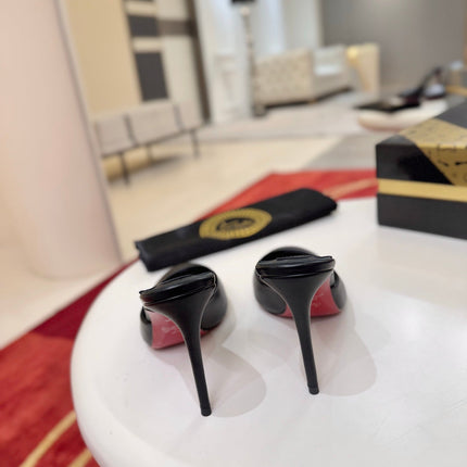 CHRISTIAN LOUBOUTIN 26S HEEL MULES 100 MM IN BLACK CALFSKIN