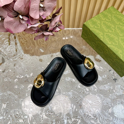 WOMEN'S SLIPPER IN BLACK CALFSKIN WITH GOLD HARDWARE