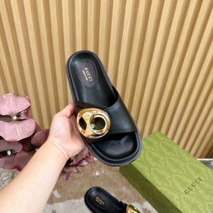 WOMEN'S SLIPPER IN BLACK CALFSKIN WITH GOLD HARDWARE