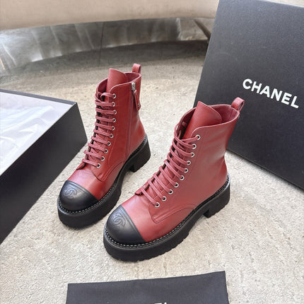 CHANEL 26S PLATFORM COMBAT BOOTS 50MM IN RED AND BLACK CALFSKIN