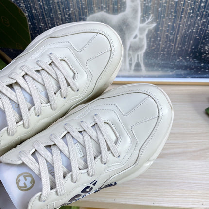 GG COUPLE TRAINER WHITE CALFSKIN WITH LEMON ICON