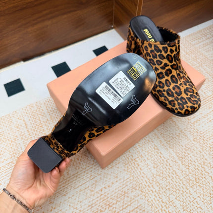 MIUMIU 26S BLOCK HEEL MULES IN LEOPARD PRINT PONY HAIR