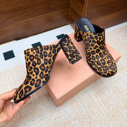 MIUMIU 26S BLOCK HEEL MULES IN LEOPARD PRINT PONY HAIR