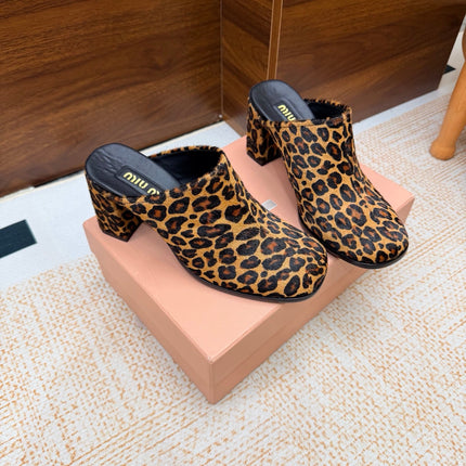 MIUMIU 26S BLOCK HEEL MULES IN LEOPARD PRINT PONY HAIR