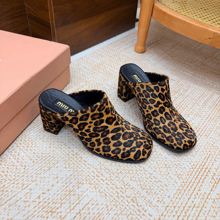 MIUMIU 26S BLOCK HEEL MULES IN LEOPARD PRINT PONY HAIR