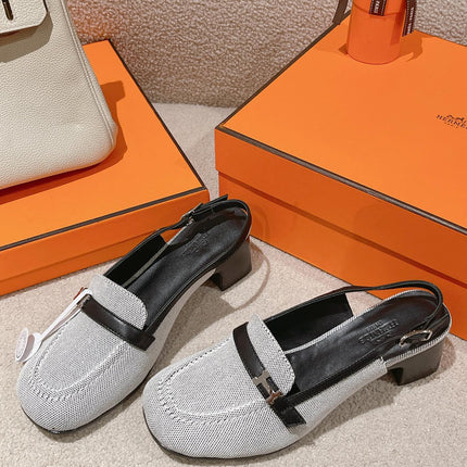 INFINIE 50 PUMP BLACK AND WHITE LAMBSKIN