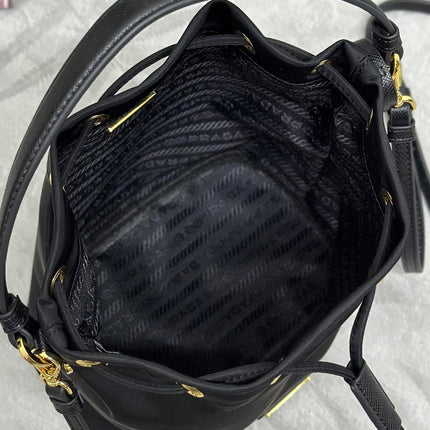 BUCKET BAG 19 IN BLACK RE-NYLON AND CALFSKIN HANDLE