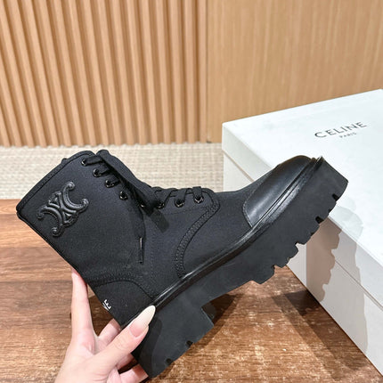 TRIOMPHE LACE-UP ANKLE BOOT IN BLACK CANVAS
