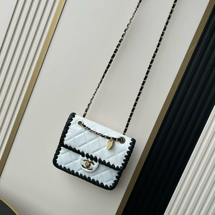 CHANEL 26S FLAP BAG 19 IN WHITE QUILTED LAMBSKIN WITH BLACK LEATHER TRIM