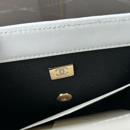 CHANEL 26S FLAP BAG 19 IN WHITE QUILTED LAMBSKIN WITH BLACK LEATHER TRIM