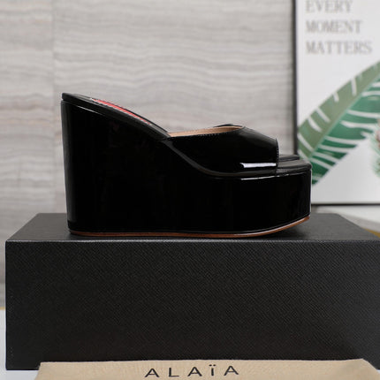 ALAIA PLATFORM WEDGE IN BLACK LAMBSKIN WITH RED HEART
