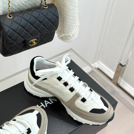 CHANEL 26S COLORBLOCK LOW TOP SNEAKERS IN WHITE BLACK CALFSKIN AND GRAY SUEDE