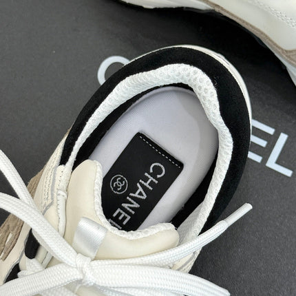 CHANEL 26S COLORBLOCK LOW TOP SNEAKERS IN WHITE BLACK CALFSKIN AND GRAY SUEDE