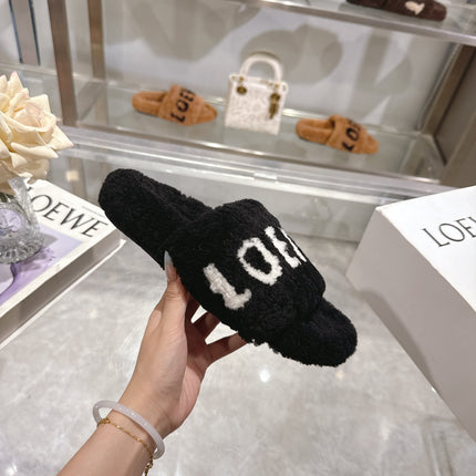 LOEWE 26S FLUFFY SLIDE SANDALS IN BLACK SHEARLING WITH WHITE LOGO