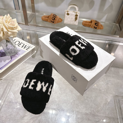 LOEWE 26S FLUFFY SLIDE SANDALS IN BLACK SHEARLING WITH WHITE LOGO