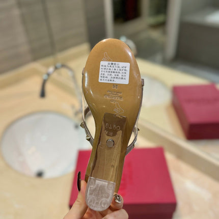 ROCKSTUD MULE SANDALS IN LIGHT PINK CALFSKIN AND TRANSPARENT PVC FILM